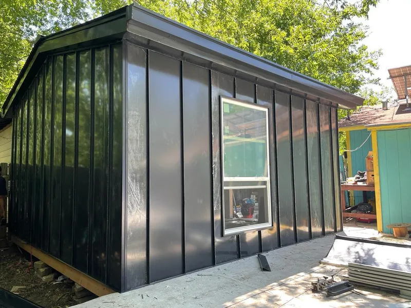 Black standing seam metal wall panels for Roof Inspection in Perris